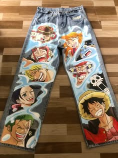 Hand-painted Anime-Inspired pants. Straw Hats Crew (One Piece)  #onepiece #luffy #zoro #namionepiece #usopp  #sanji #chopperonepiece #nicorobinonepiece #brook #frankyonepiece #jinbei #handpaintedpants #paintedpants #customdesign #denimpants #jeans Jeans Painting Ideas Aesthetic, Anime Jeans, Anime Pants, Custom Jeans Diy, One Piece Birthdays, Doflamingo Wallpaper, Custom Pants, Straw Hat Pirates, Painted Clothes Diy