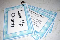 three blue and white cards with words on them