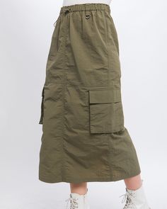 Cargo Skirt With Side Pocket Detail And Rear Slit 100% NYLON MODEL IS 5' 7" TALL, 32" CHEST, 25" WAIST, 35" HIPS AND WEARING A SIZE SMALL IMPORTED. DESIGNED IN THE USA ZIMEGO APPAREL USA BY DOUBLEZERO-BOTTOM United Parcel Service, Short Sleeve Hoodie, Cargo Skirt, Bag Dress, Edgy Outfits, Long Hoodie, Pocket Detail, Summer Essentials, Sleeveless Tank