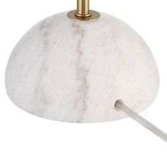 a white and gold colored light fixture on a white background with a round metal handle