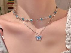 ✨ Add a touch of elegance to any outfit with our Romantic Blue Crystal Butterfly Necklace! This stunning piece features a delicate butterfly design adorned with sparkling zircon crystals that catch the light beautifully. 💙 🌟 Key Features: Charming Design: Romantic blue butterfly motif with sparkling zircon stones. Double Layered: Stylish double-layer choker that sits gracefully on your collarbone. Versatile Wear: Perfect for everyday wear or special occasions. Perfect Gift: Ideal for birthdays, anniversaries, or just because! Whether you're dressing up for a night out or adding a bit of sparkle to your everyday look, this necklace is sure to become your go-to accessory. Treat yourself or someone special to this beautiful piece! 🎁 Blue Butterfly Accessories, Elegant Blue Butterfly Charm Necklace, Elegant Blue Butterfly Necklace With Charm, Blue Butterfly Charm Jewelry For Party, Crystal Butterfly Necklace, Romantic Blue, Butterfly Motif, Delicate Butterfly, Layered Chokers