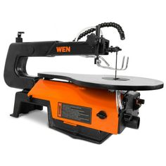 an orange and black sewing machine on a white background with the words wern printed on it