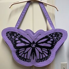 Sold Out Tote. Purple Bags With Black Print Brand New From Concert 14” X 26” 12oz Cotton Canvas Butterfly Shaped Tote Bad Featuring 2 Straps, A Gusset For Increased Space And Full Lining Tote Bad, Olivia Rodrigo Concert, Canvas Butterfly, Tory Burch Ella Tote, Butterfly Tote Bag, Olivia + Core + Aesthetic, Ella Tote, Tory Burch Ella, Vera Bradley Tote Bags