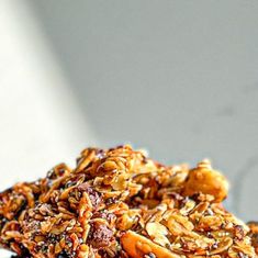 a pile of granola sitting on top of a white plate