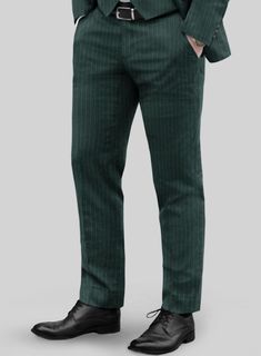 Discover a distinctive interpretation of our Green Pinstripe Pants, where sophistication is elevated to its zenith while reveling in its remarkable versatility. Made from a wool blend material, these pants exude richness and decadence. It comes in a refreshing shade of green adorned with sleek pinstripes that are bound to steal the spotlight. Whether you're in pursuit of the perfect wedding attire, a debonair choice for your groomsmen or an ensemble to turn heads at the racetrack, these pants h Business Pants With Vertical Stripes And Straight Leg, Business Straight Pants With Vertical Stripes, Business Pants With Vertical Stripes, Straight Leg Pants With Vertical Stripes For Business, Tailored Striped Straight Pants, Elegant Striped Pants With Welt Pockets, Tailored Striped Dress Pants With Straight Leg, Tailored Striped Straight Dress Pants, Formal Striped Wide Leg Pants