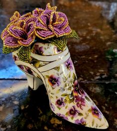 Victorian Baum Bros  Victorian Boot Shoe. Vase filled with French Beaded Flowers.  Beautiful and unique statement piece for display.  5 inches by 4 1/2 inches.  Shoe made by Baum Bros..  Flowers hand-beaded by seller. Shoe Vase, Steampunk Mixed Media, Victorian Boots, French Beaded Flowers, Woodland Park, Flowers Beautiful, Vintage Boots, Nov 6, Painted Shoes