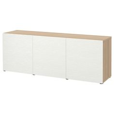 a white cabinet with two doors and three drawers