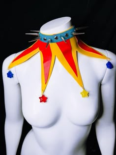 💙❤️💛 Yellow/Red/Blue Jester Collar || 🤡 🎪  Blue suede adjustable strap base with red and yellow leather material with colorful star charms ||  ⭐️⭐️⭐️ ⭐️⭐️⭐️ zinc alloy hardware || (if you have a metal allergy please message me directly to discuss my other metal options) :)  adjustable to your size! Clown Inspired Outfit Men, Clown Core Accessories, Male Clown Outfit, Leather Strap Outfit, Jester Character Design Male, Jester Outfit Drawing, Clowncore Aesthetic Outfits, Jester Outfit Design, Clowncore Accessories