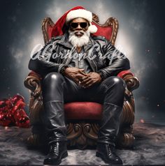 a man sitting on top of a red chair in front of a christmas tree wearing sunglasses and a santa hat