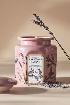 Inhale inspiration, exhale elegance. This exquisite candle is inspired by the rich history, beauty, and craftsmanship of French apothecary jars. Housed in a botanical-adorned ceramic vessel, this *only-at-Anthro* fragrance lends everyday elegance to any living space - *and* is perfectly giftable for the scent-obsessed. Lavender Balsam (Fresh Floral): Aromatic green lavender layered with fresh balsam, effervescent citrus accents, and warm hickory over an appealing background of black amber. *For Anthropologie Home Candles, Anthropologie Candles, Anthropology Candle, Candle In Ceramic Jar, Lavender Home Decor, Lavender Candle Aesthetic, French Apothecary, Balsam Candle, Lavendar Candle