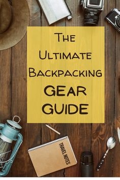 the ultimate backpacking gear guide is displayed on a wooden table with other items around it