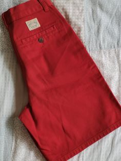 Vintage Polo Chino shorts by Ralph Lauren from the 1980's. Women's high waist preppy shorts in brick red. Pleated front, two front pockets and two back pockets. Zipper fly closure. Material: 100% Cotton Size: Marked T10. Fit like women's XXS. To be sure this item would fit you, please look at the measurements below. Approximate Measurements (taken with shorts lying flat, double waist and hips ) Waist (double that): 11.4 inches / 29 cm Hips (double that) : 18.9 inches / 48 cm Overall Length: 17.2 Red Cotton Bottoms With Belt Loops, Retro Cotton Bottoms With Built-in Shorts, Retro Cotton Bottoms With Short Length, Retro Cotton Shorts, Retro Red Short Shorts, Red Cotton Bottoms With Built-in Shorts, Vintage Knee-length Shorts With Pockets, Casual Red Bermuda Shorts For Summer, Vintage Cotton Bermuda Shorts