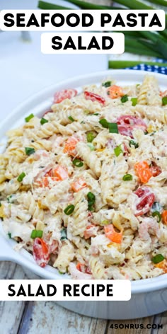 seafood pasta salad in a white serving dish