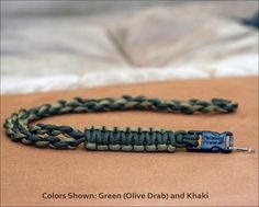 a close up of a cord on a bed with a pillow in the background and text that reads colors show green olive drab and khaki