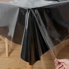 Clear vinyl Tablecloth Protector allows the beauty of your natural wood table or fine linens to show through and it can be easily cut into the size you need to cover other stuff. High Quality and Environmental Material: The tablecloth is of high quality and it is 100% PVC. It is safe to use even for children and the elderly. Due to the fold packaging method of the tablecloth, some fold creases can't be avoided when opening the package. The creases will fade away In the process of your use or you Dining Table Outdoor, White Plastic Table, Pvc Table, Clear Table, Coffee Table Mat, Plastic Table Covers, Table Outdoor, Tablecloth Sizes, Plastic Tablecloth