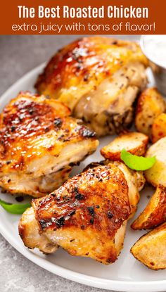 the best roasted chicken extra juicy with tons of flavor is served on a white plate