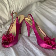 These Pumps Feature A Satin Upper, A Peep-Toe Opening, A Satin Flower Detail At The Vamp, Leather Lining And Insoles, A Sculpted Enamel Conical Heel, And Leather Soles. I Bought These One Size Too Big So The Few Times I’ve Worn Them, I Padded Them Up, Which Is Why They Look So Good. The Only Part That Looks Worn Is The Bottom. They Are Timeless Party Shoes. A Little Bit Of Steam On The Flowers Help Them Pop Like New, So Do That Before Wearing Them Out! Pink Wedding Shoes For Evening In Spring, Pink Wedding Shoes For Spring Evening, Vintage Pink Heels For Formal Occasions, Flower Heels, Satin Flowers, Flower Detail, The Vamps, Pink Satin, Party Shoes