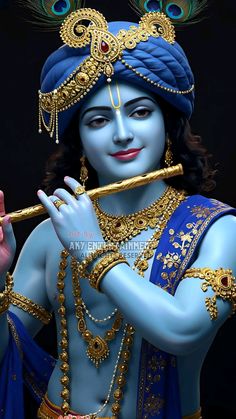 the god is playing flute with his hands and body painted blue, while wearing gold jewelry