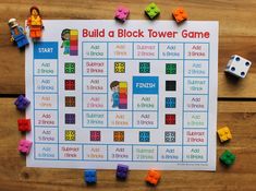 a game board with legos and building blocks on the table next to it is called build a block tower game