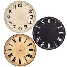 three clocks with roman numerals and numbers on them