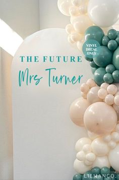 the future mrs turver balloon arch is decorated with white, green and blue balloons