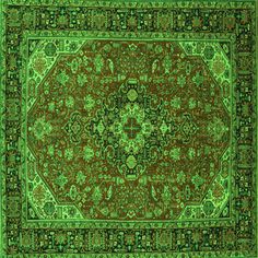 a green rug with an ornate design on it