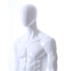 a white male mannequin standing in front of a white background with no shirt on