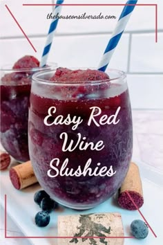 red wine slushies in glasses with blueberries and cinnamons on the side