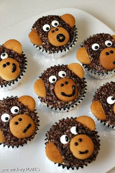 cupcakes decorated like monkeys with googly eyes