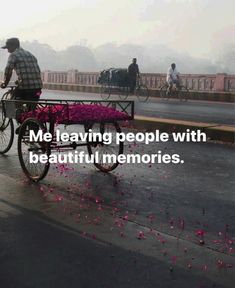 a man riding a bike with pink flowers on the back and words that read, me leaving people with beautiful memories