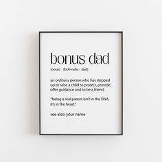 a framed print with the words,'bonus dad'in black and white