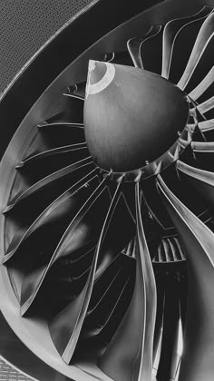 an airplane engine showing the turbine blades