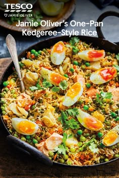 a skillet filled with rice, peas and eggs