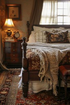 a bed sitting in a bedroom next to a window