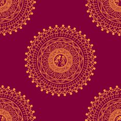 an orange and red circular design on a maroon background