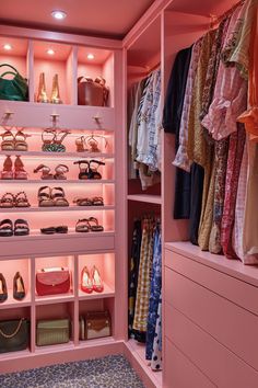 the closet is filled with shoes, handbags and purses