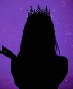 the silhouette of a woman with a crown on her head, against a purple background