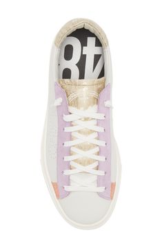 A perforated logo adds a signature finish to a luxe leather sneaker with colorblocked trims and a well-worn bumper sole. Leather upper and lining/rubber sole Made in Portugal P448 Sneakers, Wishlist Ideas, White Pastel, Top Sneakers Women, Sneaker Style, Popular Sneakers, Shoe Inspo, Leather Sneakers, Low Top