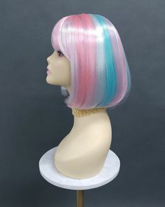 "Simple short straight bob wig with bangs. Lightweight and easy to wear. Inside cap has adjustable elastic straps, no combs or clips. Color: Pink, White, Blue Style: 9 inches, Short, straight Circumference: Default at 21\" with adjustable cap (max 22\"). Materials: Synthetic Wig Fiber All sales are final. Please read all store policies before purchasing." Boy Wig, Short Straight Bob, Bleu Pastel, Straight Bob, Blue Pastel, Bob Wig, Short Wigs, Costume Wigs, Blue Style