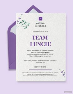 a purple and white card with the words team lunch on it, next to an envelope