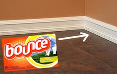 a box of bounce on the floor with an arrow pointing to it's side