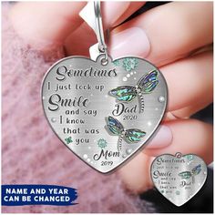 a heart shaped keychain with the words, i just took up smile and say dad