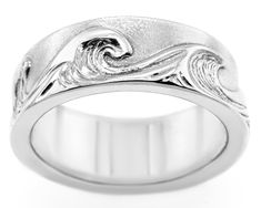 The Endless Wave Ring. A wide band ring with individually carved waves wrapping around. Every wave has been hand-carved so that each one is unique and different from the next. No two waves are the same, and each flows into the next, capturing the ocean's vastness and ever-changing nature. A beautiful and special ring for the true ocean-lover. A great unisex ring, suitable for both women and men. Ring can also be customised to a specific width and/or gemstones added in - please contact us with an Ocean Ring, Wave Jewelry, Jewelry Ocean, Surf Jewelry, Wide Band Ring, Ocean Jewelry, Wave Ring, Special Ring, Men Ring