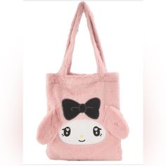 Sanrio’s Soft My Melody Fuzzy Feelings Tote Bag Is Functional And Stylish. With Black Bow, Signature Floppy Ears And Embroidered Heart Eyes. Show Your Plush Love While On The Move. Length : 15 Inches Width : 13 Inches One Large Opening With A Magnetic Closure Inside Open Pocket 100% Polyester Limited Edition Free Gift With Purchase! Sanrio Bag, Digital Wardrobe, Dream Items, Scene Punk, Sanrio My Melody, Jirai Kei, Multipurpose Bag, Floppy Ears, Boss Baby