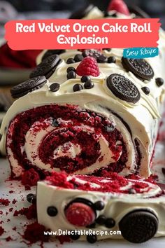 a red velvet oreo cake roll with white frosting