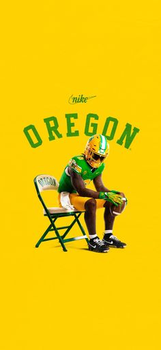 a football player sitting in a chair with the words oregon on it's back