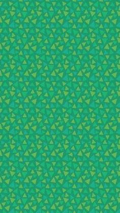 an abstract green background with small triangles