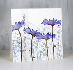 there is a card with blue flowers on it