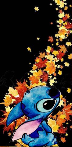 an image of stitchy in the fall leaves