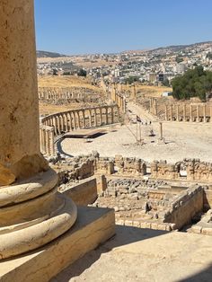 the ruins of an ancient city are seen in this image from above, with columns and pillars